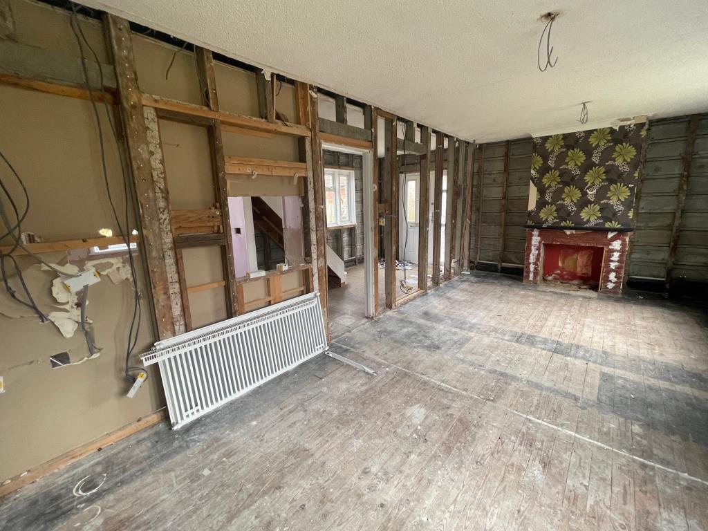 Lot: 163 - SEMI-DETACHED HOUSE FOR IMPROVEMENT - Alternative view of ground floor fireplace
